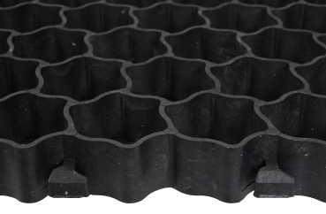 Stabile, wasserdurchlässige Paddockplatten als Bodenlösung für Reitplätze, bieten eine trittsichere, rutschfeste und langlebige Grundlage für optimale Trainingsbedingungen.